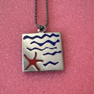 Silver Pendant with Red and Blue Design